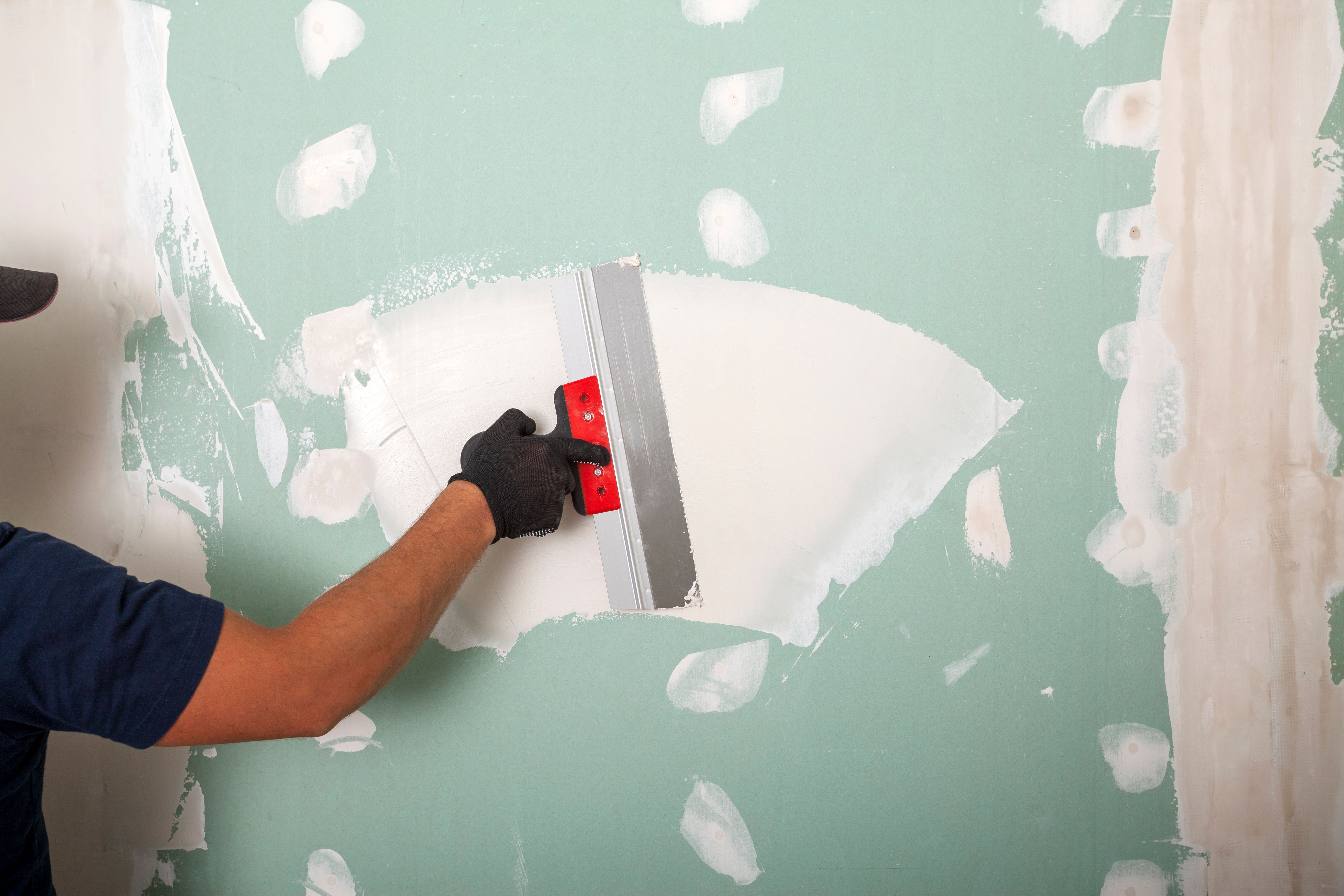 room in mudding stage of drywalling